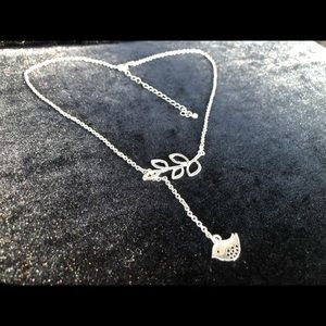 Silver leaf and bird necklace